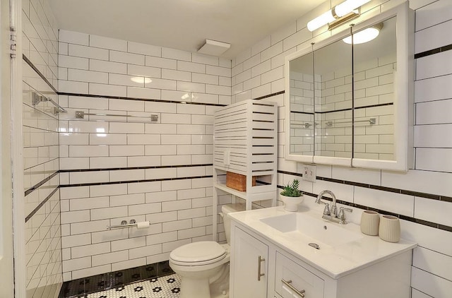 940 Bloomfield St # 1, Hoboken, NJ 07030 - full bath with tile walls, vanity, tiled shower, and tasteful backsplash