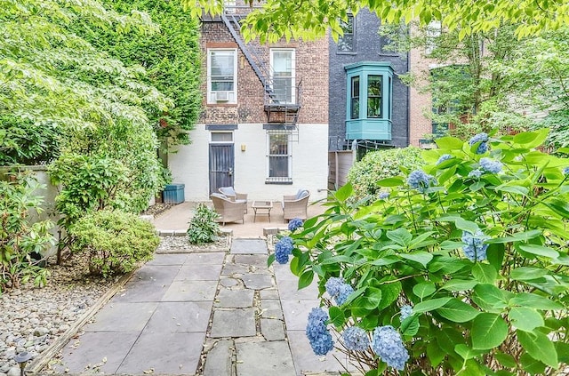 940 Bloomfield St # 1, Hoboken, NJ 07030 - rear view of house with brick siding and cooling unit