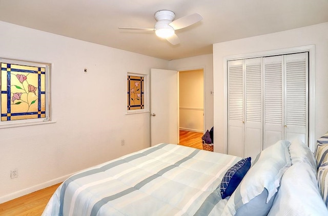 940 Bloomfield St # 1, Hoboken, NJ 07030 - bedroom with wood finished floors, a closet, and a ceiling fan