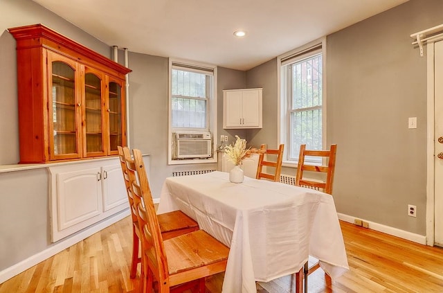 940 Bloomfield St # 1, Hoboken, NJ 07030 - dining room with light wood-type flooring, radiator, cooling unit, and recessed lighting