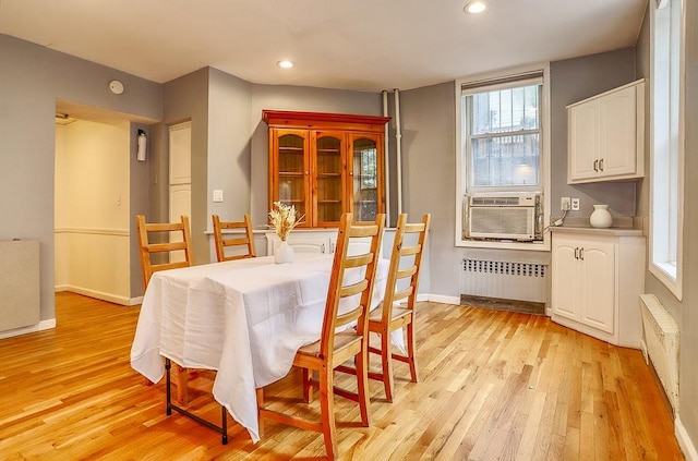940 Bloomfield St # 1, Hoboken, NJ 07030 - dining area featuring radiator, cooling unit, light wood-style floors, and recessed lighting