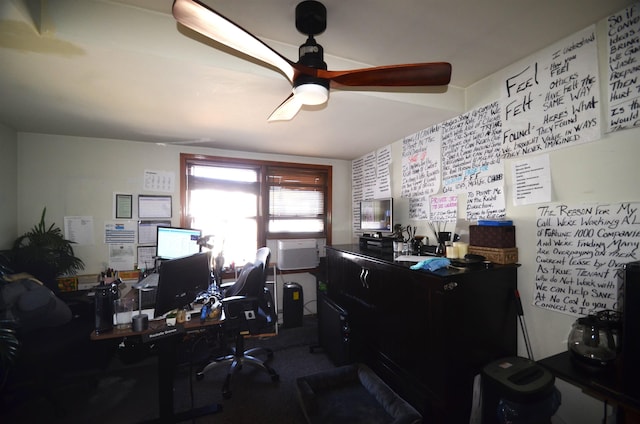 office space featuring a ceiling fan