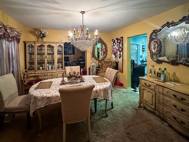 dining space with dark carpet and a notable chandelier