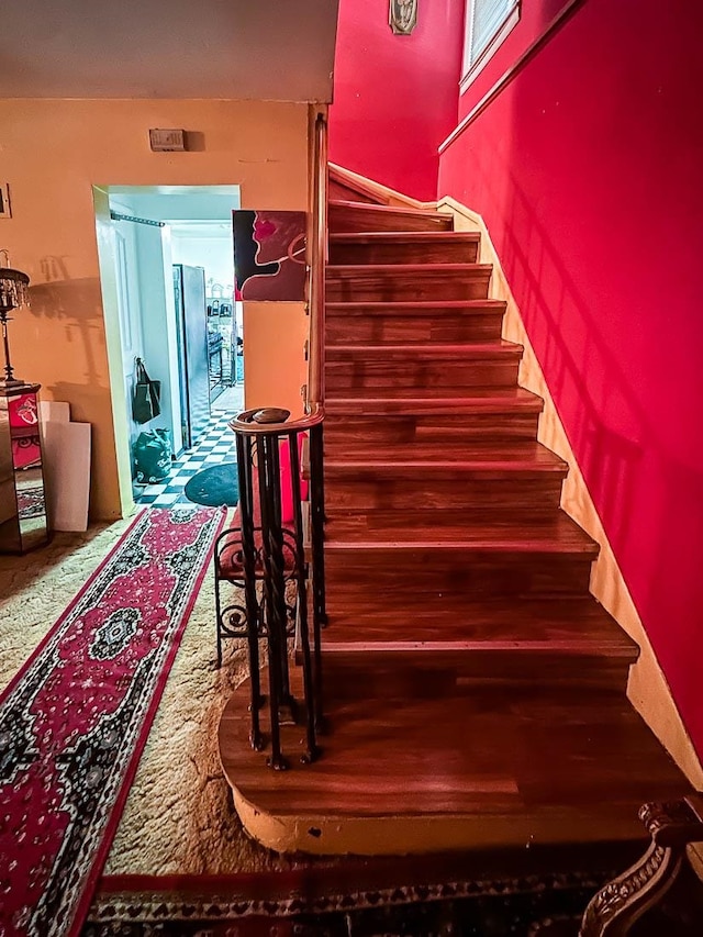 stairs with carpet floors