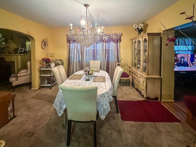 dining space featuring an inviting chandelier