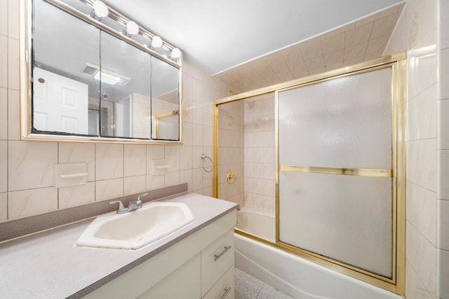 1007 88th St, North Bergen, NJ 07047 - full bath with vanity, tile walls, shower / bath combination with glass door, and decorative backsplash