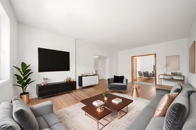1007 88th St, North Bergen, NJ 07047 - living area featuring light wood-style floors