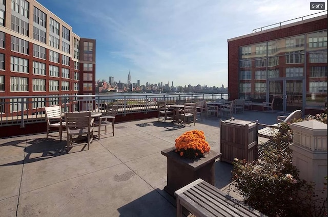 view of patio / terrace featuring a view of city