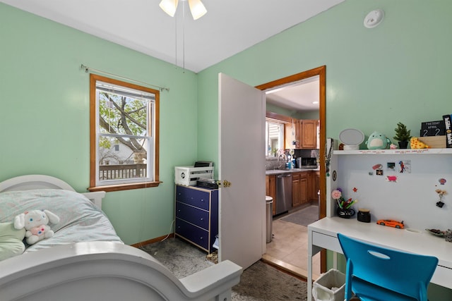 bedroom with a sink and ensuite bathroom