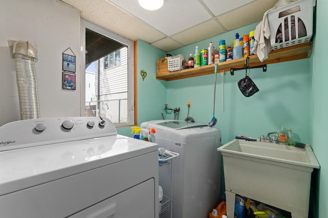 laundry room with washing machine and clothes dryer