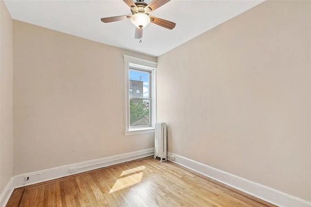 16 Belvidere Ave Unit 3F, Jersey City, NJ 07304 - unfurnished room featuring radiator, baseboards, light wood-type flooring, and a ceiling fan