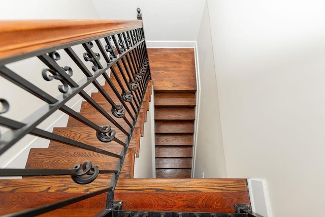 stairs featuring baseboards
