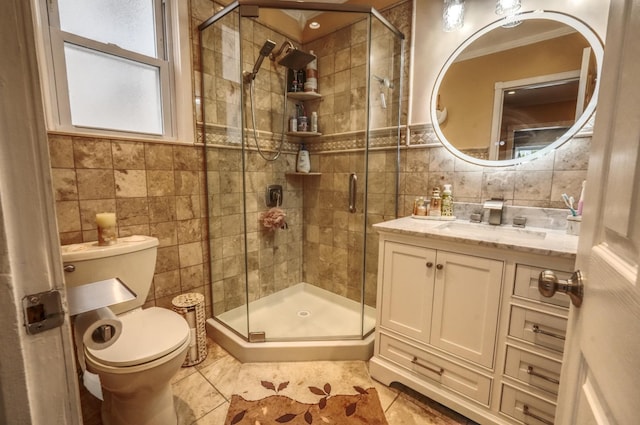 1404 81st St, North Bergen, NJ 07047 - bathroom with tile walls, tile patterned flooring, toilet, vanity, and a shower stall