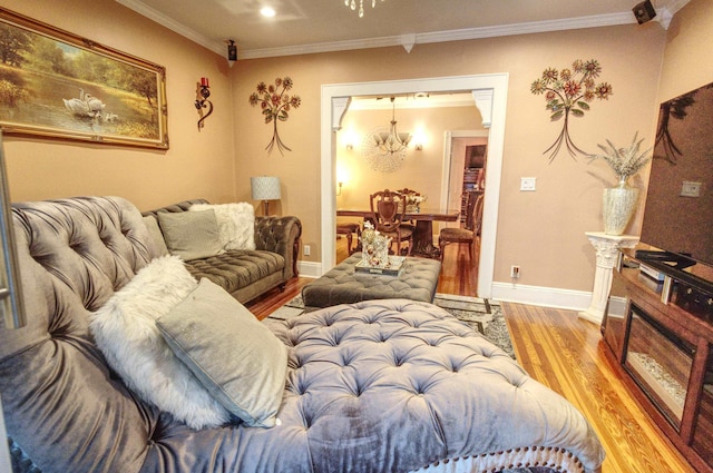 1404 81st St, North Bergen, NJ 07047 - living area with ornamental molding, wood finished floors, a chandelier, and baseboards
