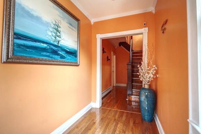 1404 81st St, North Bergen, NJ 07047 - hallway featuring wood finished floors, crown molding, baseboards, and a baseboard heating unit