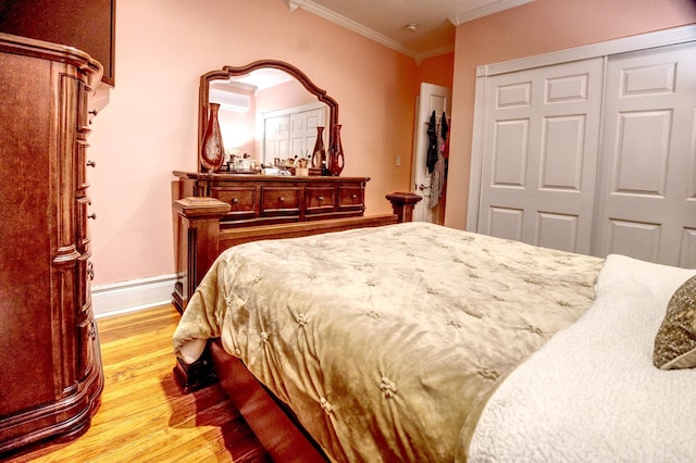 1404 81st St, North Bergen, NJ 07047 - bedroom featuring light wood-type flooring, crown molding, and a closet