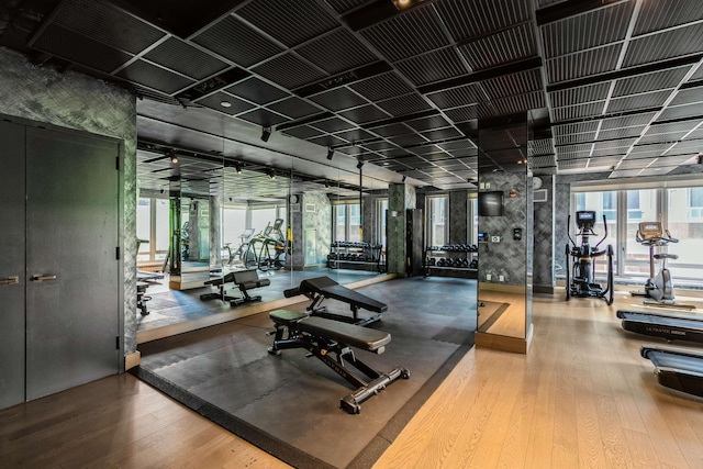 2 Shore Ln Unit 410, Jersey City, NJ 07310 - exercise room featuring wood finished floors