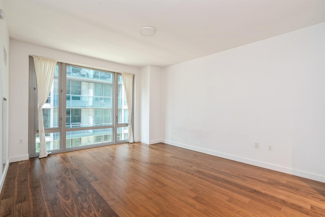 2 Shore Ln Unit 410, Jersey City, NJ 07310 - spare room with wood finished floors