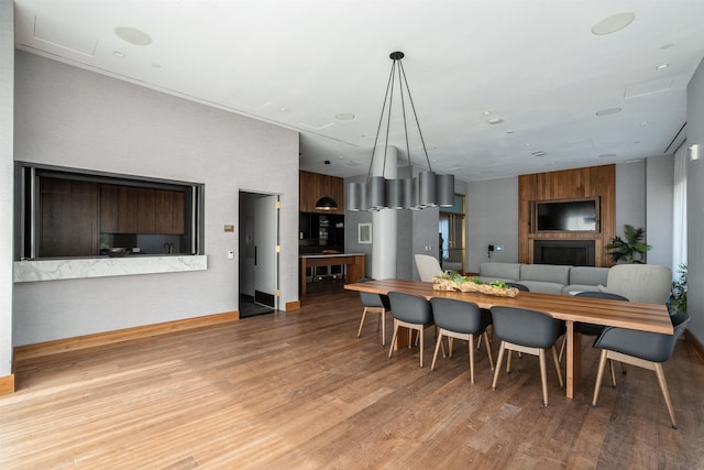 2 Shore Ln Unit 410, Jersey City, NJ 07310 - dining area featuring light wood finished floors and baseboards