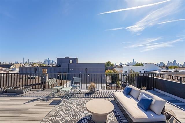 41 Graham St Unit 2, Jersey City, NJ 07307 - view of patio featuring an outdoor living space and a view of skyline
