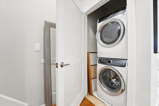 41 Graham St Unit 2, Jersey City, NJ 07307 - laundry room featuring estacked washer and dryer