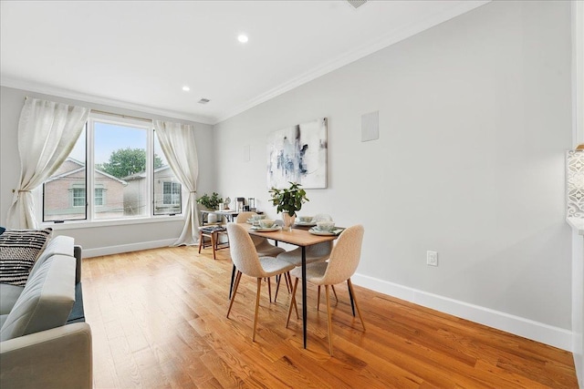 41 Graham St Unit 2, Jersey City, NJ 07307 - dining room with ornamental molding, baseboards, light wood-type flooring, and recessed lighting