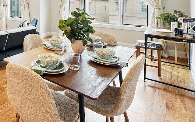 41 Graham St Unit 2, Jersey City, NJ 07307 - dining space with baseboards and wood finished floors