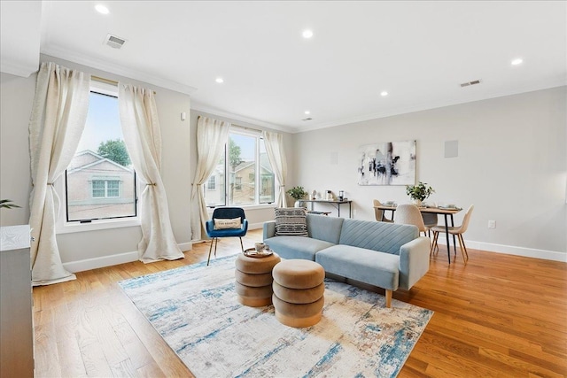 41 Graham St Unit 2, Jersey City, NJ 07307 - living area featuring crown molding, baseboards, light wood-style floors, and recessed lighting