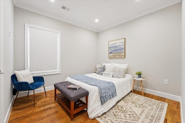 41 Graham St Unit 2, Jersey City, NJ 07307 - bedroom featuring ornamental molding, baseboards, wood finished floors, and recessed lighting