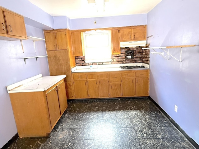 1437 Gehr Pl, North Bergen, NJ 07407 - kitchen featuring open shelves, under cabinet range hood, light countertops, backsplash, and stainless steel gas cooktop