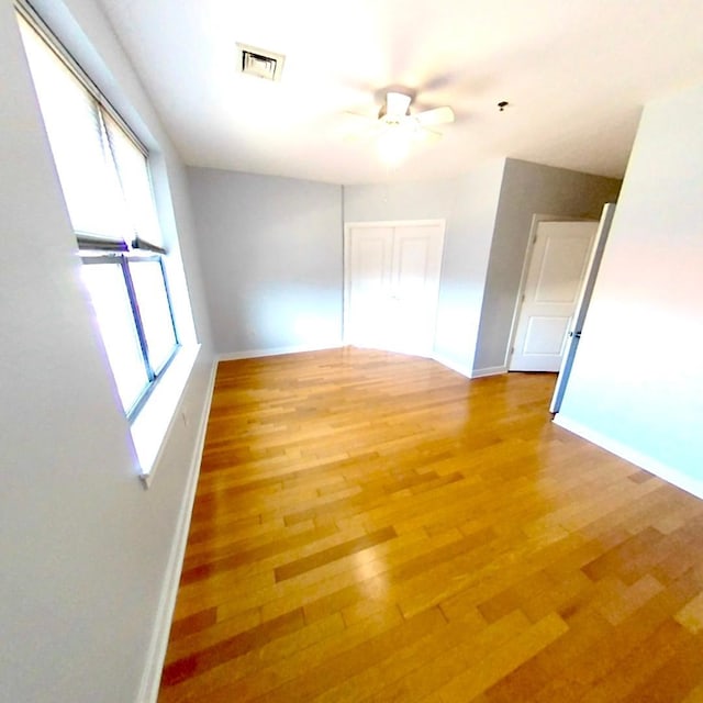 172 Culver Ave Unit 301, Jersey City, NJ 07305 - empty room featuring baseboards, wood finished floors, and ceiling fan
