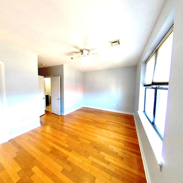 172 Culver Ave Unit 301, Jersey City, NJ 07305 - spare room featuring light wood-style flooring and ceiling fan