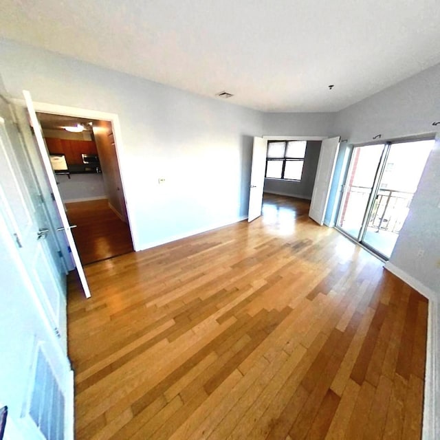 172 Culver Ave Unit 301, Jersey City, NJ 07305 - empty room with light wood finished floors and baseboards