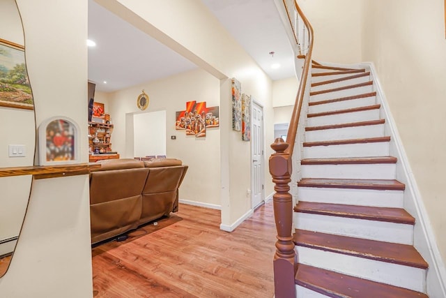 1527 38th St, North Bergen, NJ 07047 - staircase with wood finished floors, baseboards, and recessed lighting