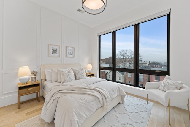 bedroom featuring light hardwood / wood-style flooring