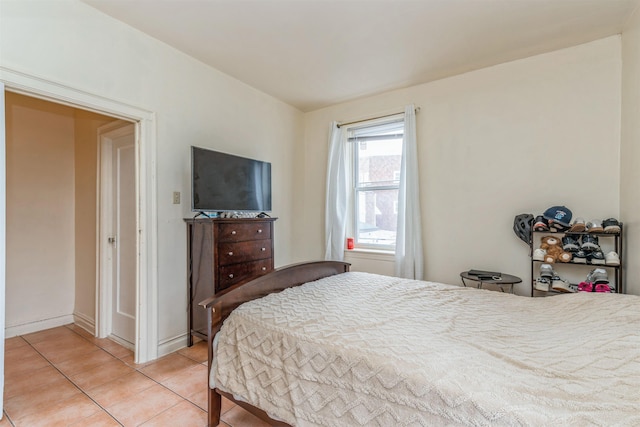 bedroom featuring tile patterned floors