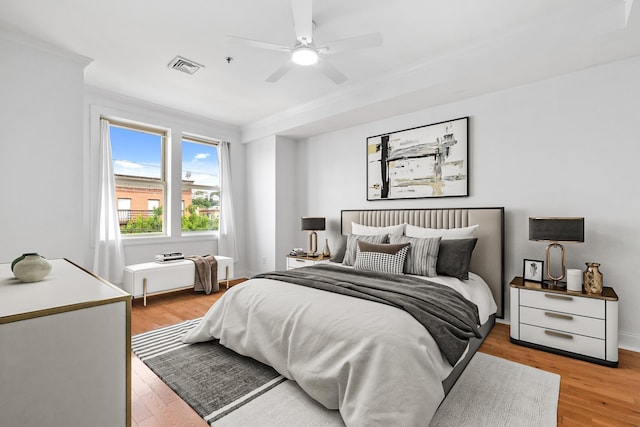 413 Madison St Unit 4, Hoboken, NJ 07030 - bedroom with ornamental molding, light wood-style flooring, and ceiling fan