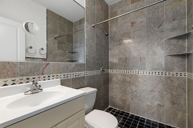 413 Madison St Unit 4, Hoboken, NJ 07030 - full bathroom featuring tiled shower, vanity, and tile walls