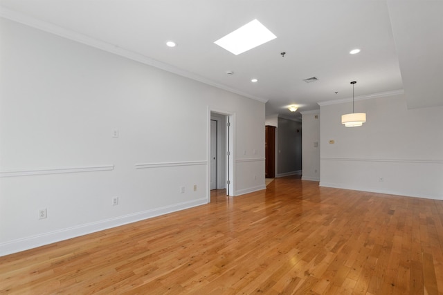 413 Madison St Unit 4, Hoboken, NJ 07030 - unfurnished room with ornamental molding, light wood finished floors, recessed lighting, and a skylight