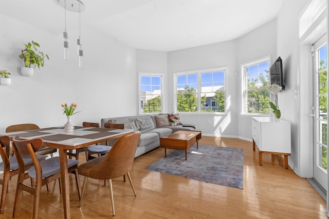 4 Constellation Pl Unit 401, Jersey City, NJ 07305 - dining area featuring light wood-style floors and baseboards