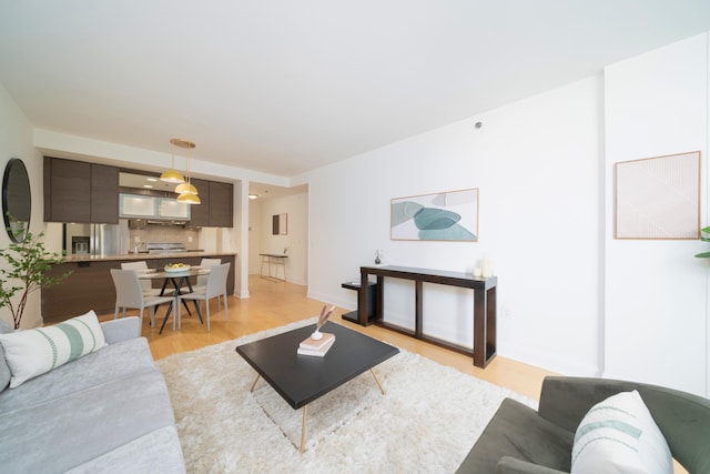 living room with light hardwood / wood-style floors