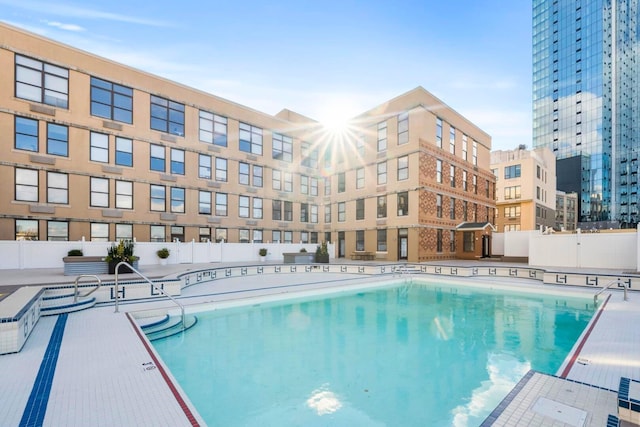 view of swimming pool featuring a patio