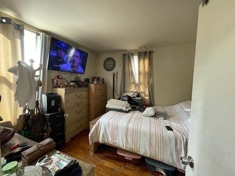 bedroom featuring hardwood / wood-style floors