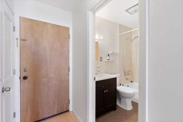 bathroom with shower / tub combination, vanity, toilet, and wood finished floors