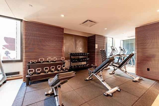 exercise room with recessed lighting