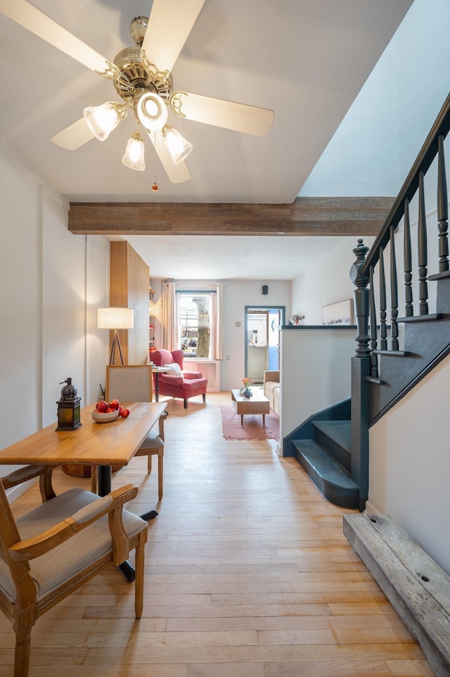 306 Sip Ave Unit 306A, Jersey City, NJ 07306 - dining space featuring beam ceiling, stairs, ceiling fan, and light wood-type flooring
