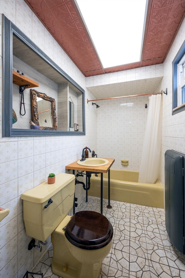 306 Sip Ave Unit 306A, Jersey City, NJ 07306 - full bathroom with tile walls, a skylight, and shower / bath combo