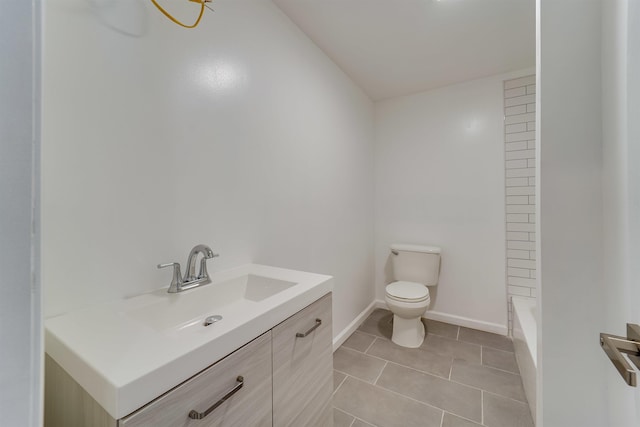 full bathroom with vanity, baseboards, tile patterned floors, walk in shower, and toilet