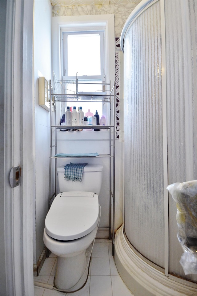 34 Concord St, Jersey City, NJ 07306 - bathroom with toilet, tile patterned floors, and a stall shower