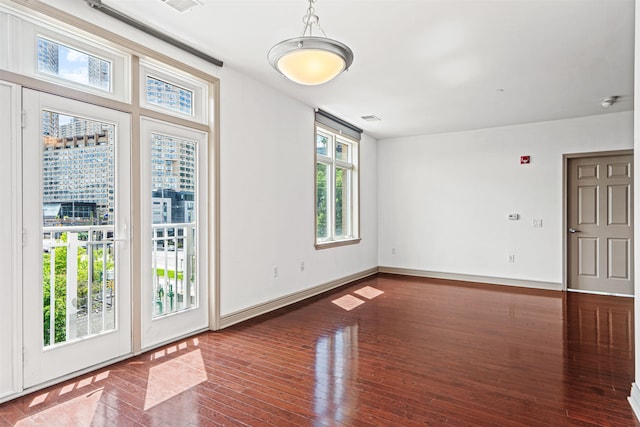 7400 River Rd Unit 304, North Bergen, NJ 07047 - spare room featuring wood finished floors and baseboards